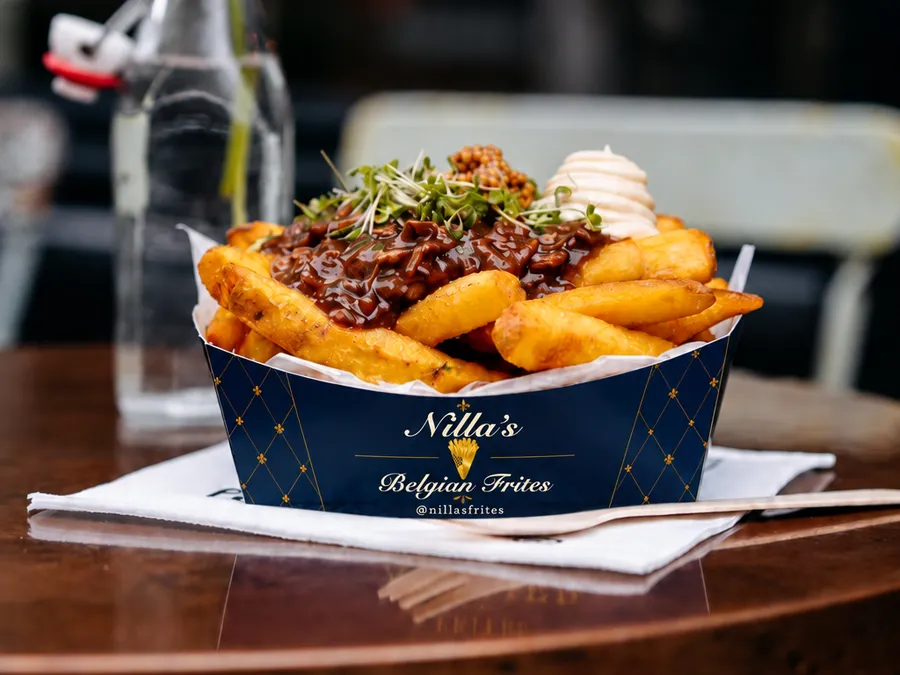 Nillas Belgian Frites brisket loaded fries with aioli in a branded tray